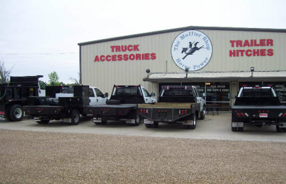 Truck muffler shop top